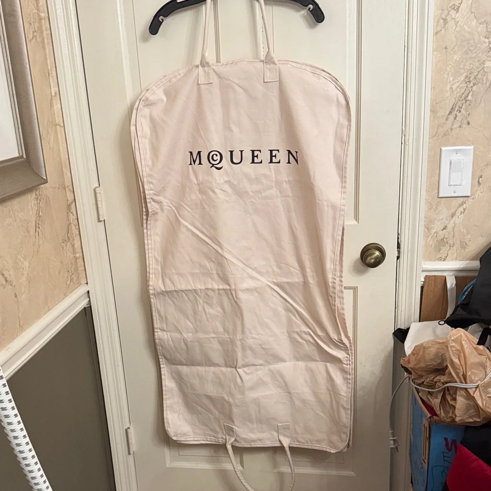 New McQueen Cream Garment Bag with hanger